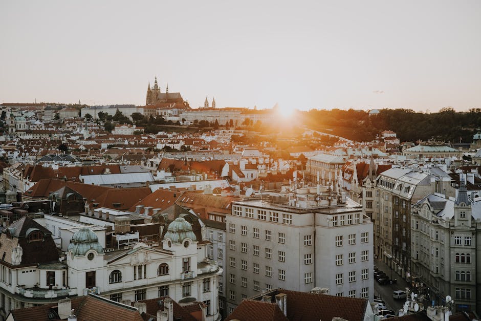 Stunning view of Prague at sunset, highlighting the historic skyline and architectural beauty.