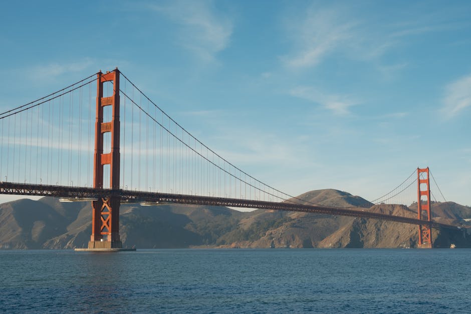 Stunning view of the Golden Gate Bridge under a bright blue sky in San Francisco.